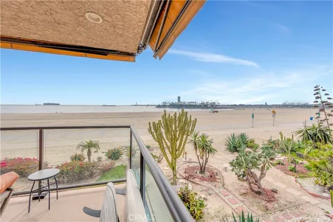 a view of swimming pool from a balcony