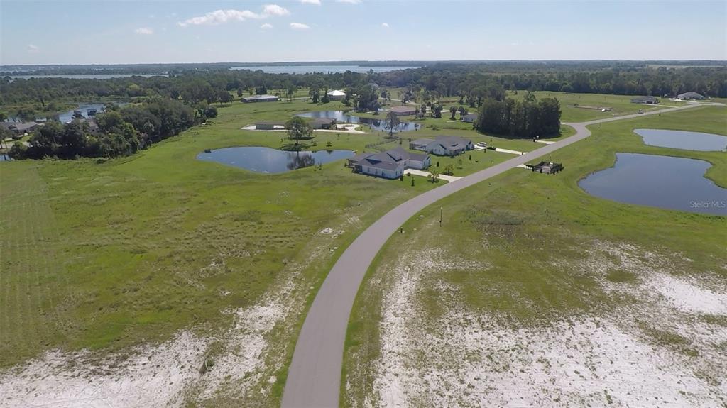 3412 Lake Diane Road, Unit 67 Tavares, FL 32778 - Photo 11 of 11 a view of a lake with a mountain