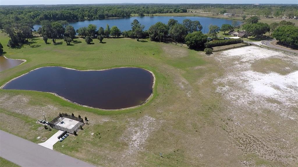 3412 Lake Diane Road, Unit 67 Tavares, FL 32778 - Photo 3 of 11 an aerial view of a house