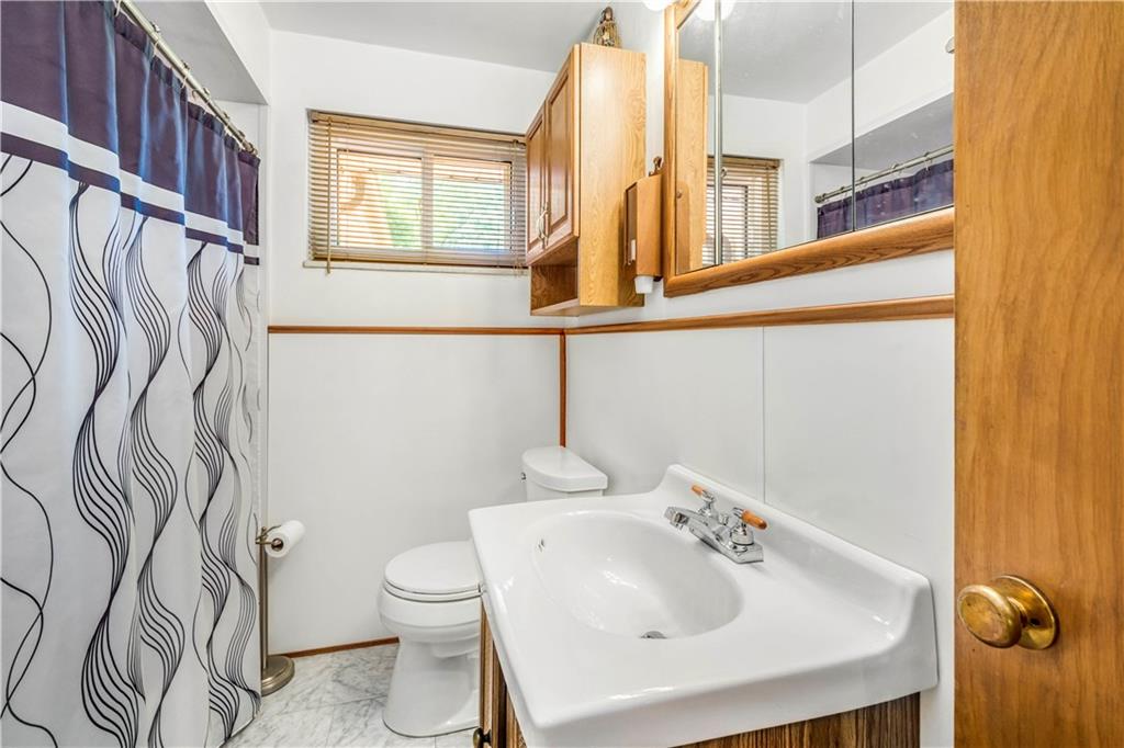41 Flora Road Pittsburgh, PA 15227 - Photo 15 of 25 The main floor full bathroom has a Bath Fitters tub/shower combo, updated flooring & a bonus linen closet.