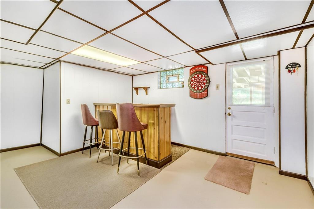 41 Flora Road Pittsburgh, PA 15227 - Photo 17 of 25 Entertain friends here at the bar, turn this space into a home gym, or your "work from home" office!