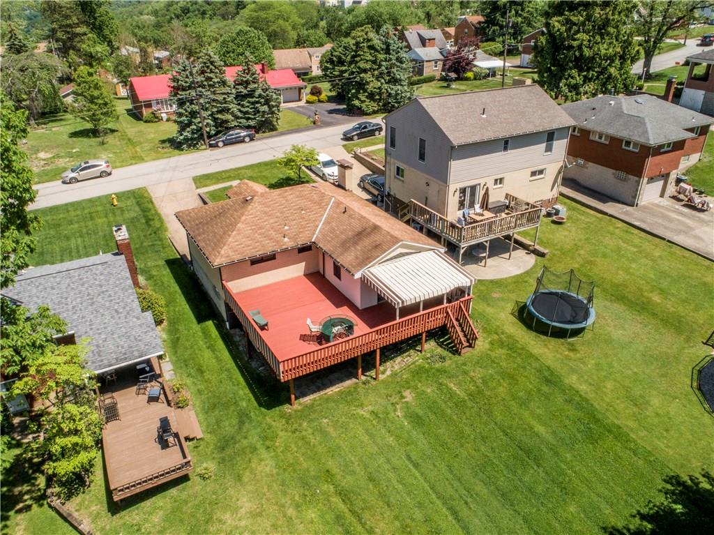 41 Flora Road Pittsburgh, PA 15227 - Photo 22 of 25 From this angle you can really see the addition! And there is a shed conveniently tucked under the deck.