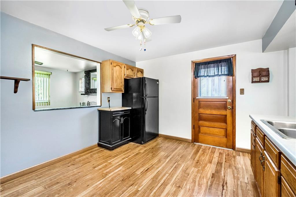 41 Flora Road Pittsburgh, PA 15227 - Photo 8 of 25 Looking for a cozy breakfast nook? One can easily fit in the spacious kitchen.