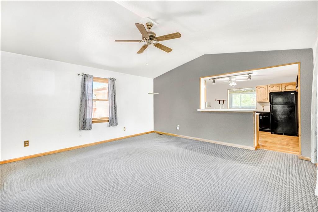 41 Flora Road Pittsburgh, PA 15227 - Photo 9 of 25 Beyond the kitchen, the family room addition has vaulted ceilings, giving the room a grand feel.