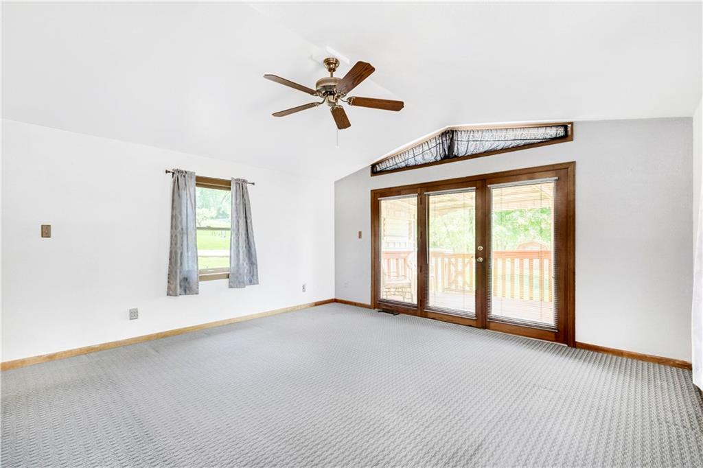 41 Flora Road Pittsburgh, PA 15227 - Photo 10 of 25 Glass paned doors let in tons of extra light and serve as a transition the the oversized back deck.