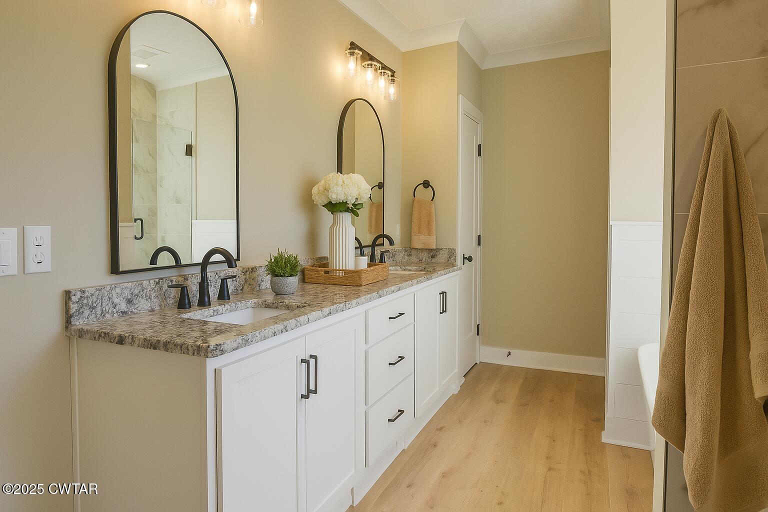 297 Marlow Cemetery Road Gadsden, TN 38337 - Photo 16 of 28 a spacious bathroom with a double vanity sink and a mirror