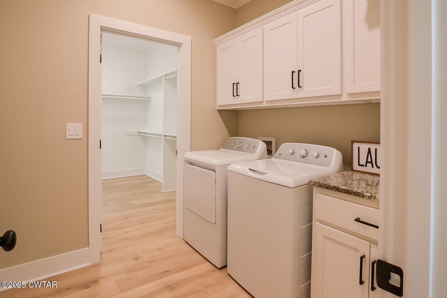 297 Marlow Cemetery Road Gadsden, TN 38337 - Photo 19 of 28 a utility room with dryer and washer