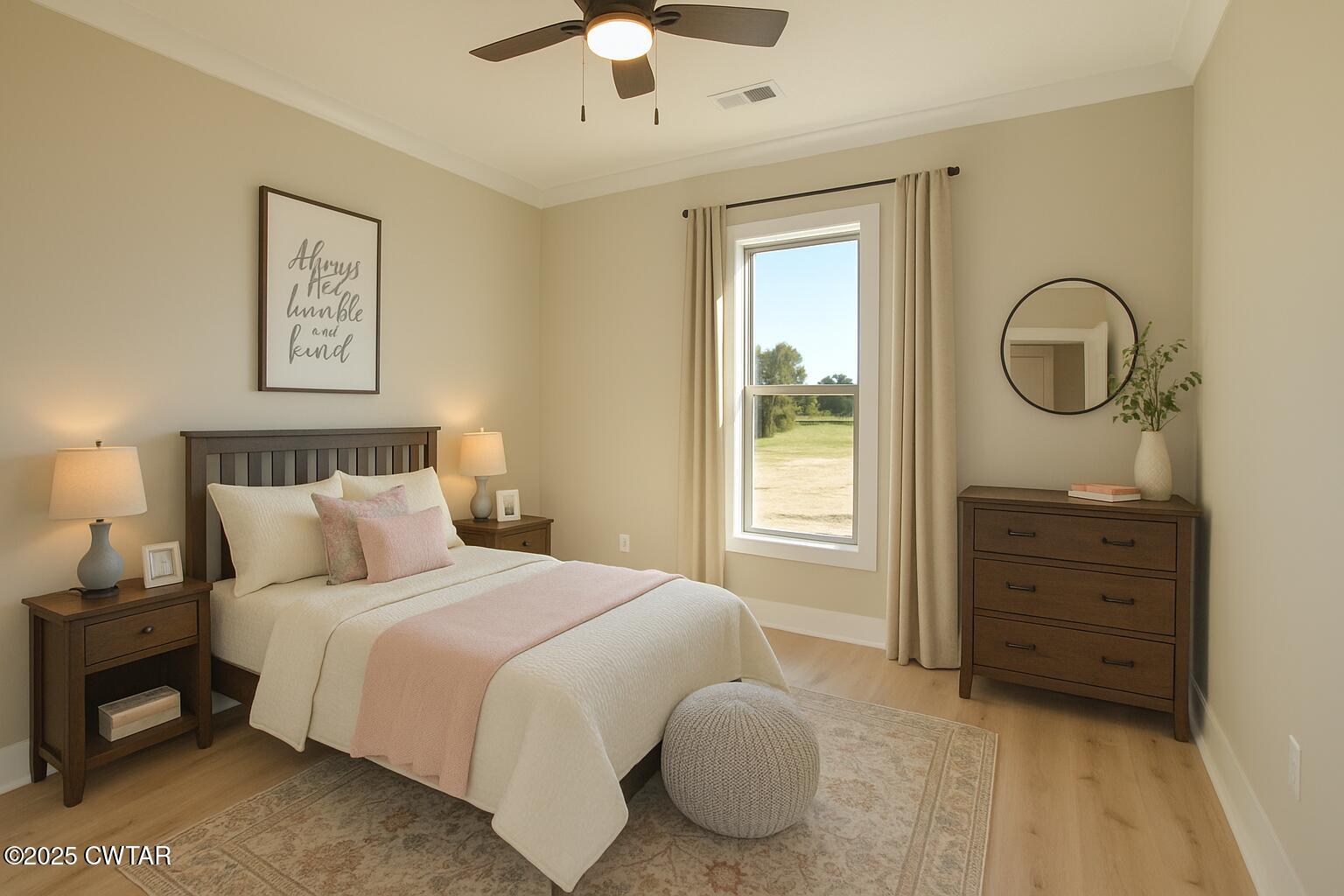 297 Marlow Cemetery Road Gadsden, TN 38337 - Photo 20 of 28 a bedroom with a bed and a chandelier