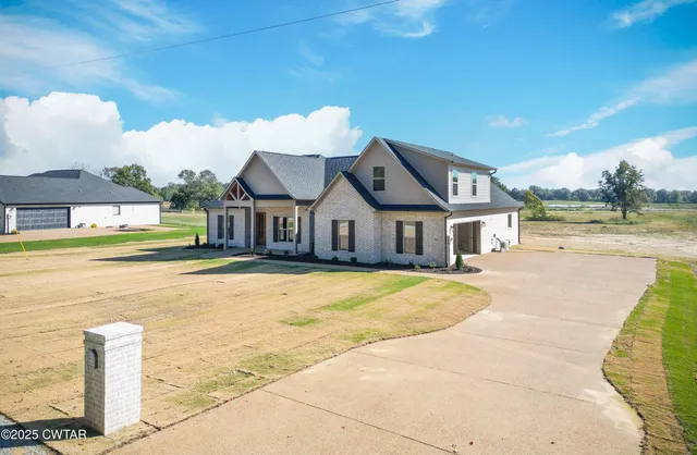 a front view of house with yard