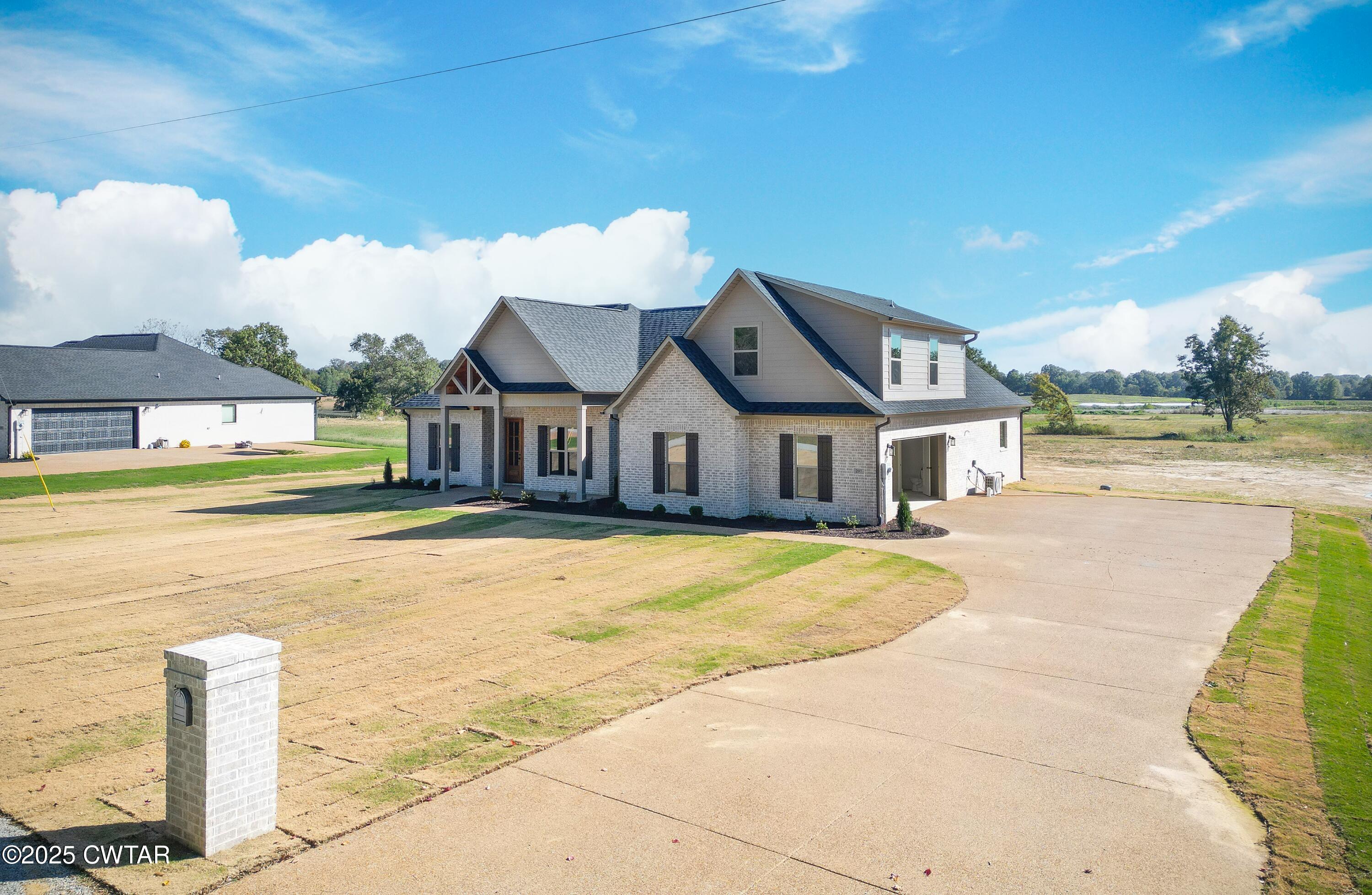 297 Marlow Cemetery Road Gadsden, TN 38337 - Photo 2 of 28 a front view of house with yard