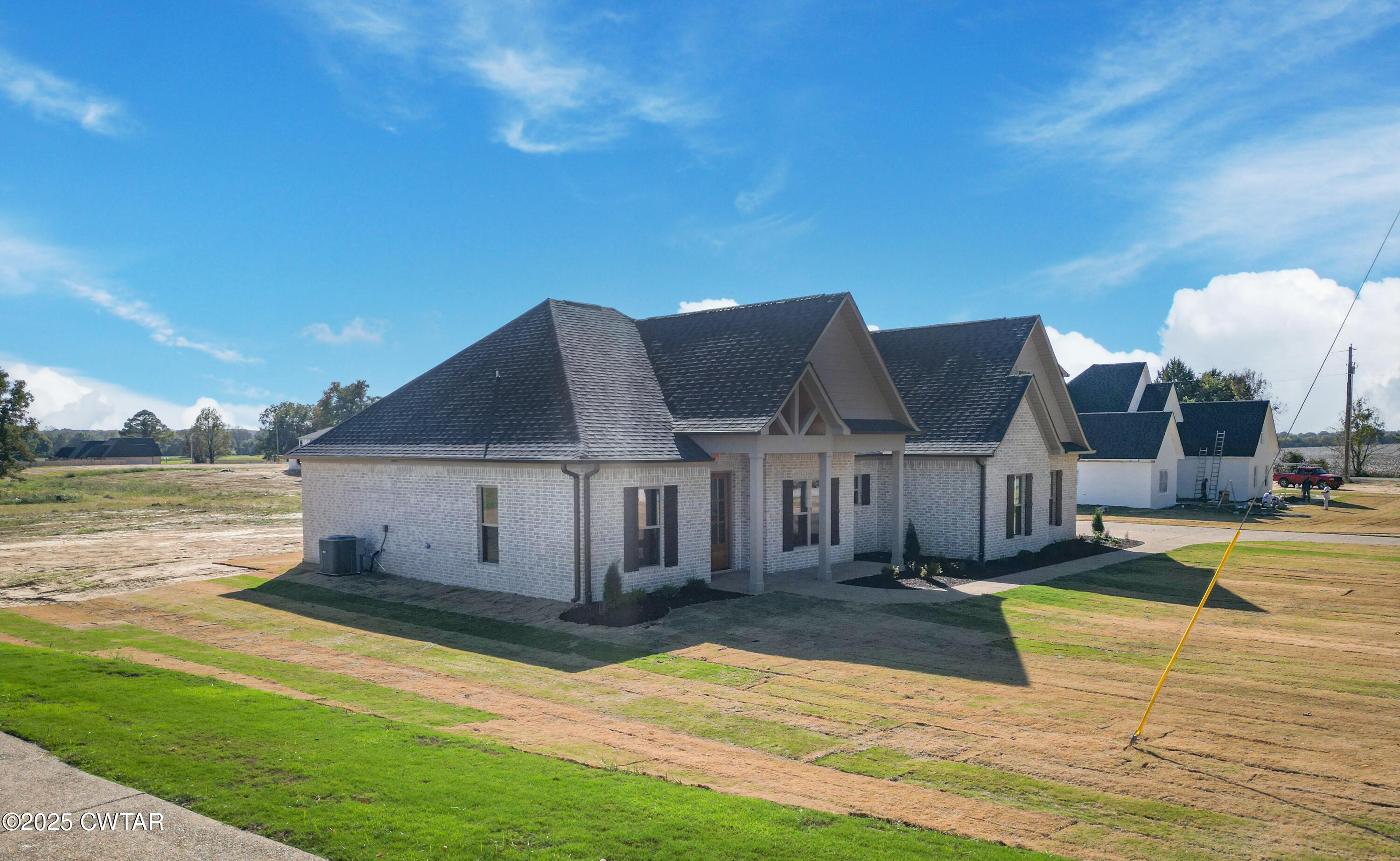 297 Marlow Cemetery Road Gadsden, TN 38337 - Photo 3 of 28 a view of a house with swimming pool and porch with furniture