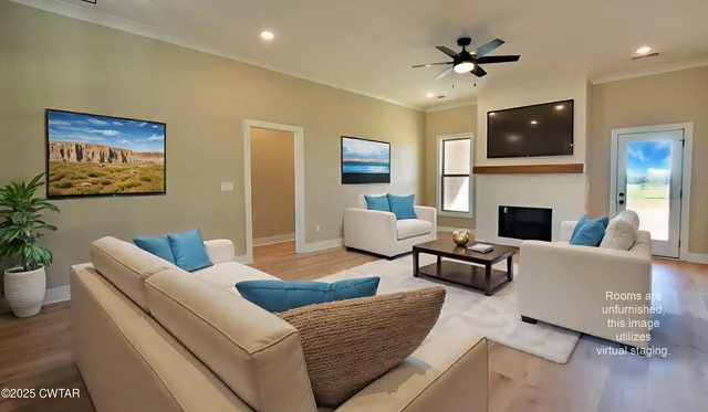 a living room with furniture fireplace and a flat screen tv