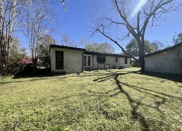 215 Seminole Trail Crestview, FL 32536 - Photo 13 of 20 a house with trees in front of it