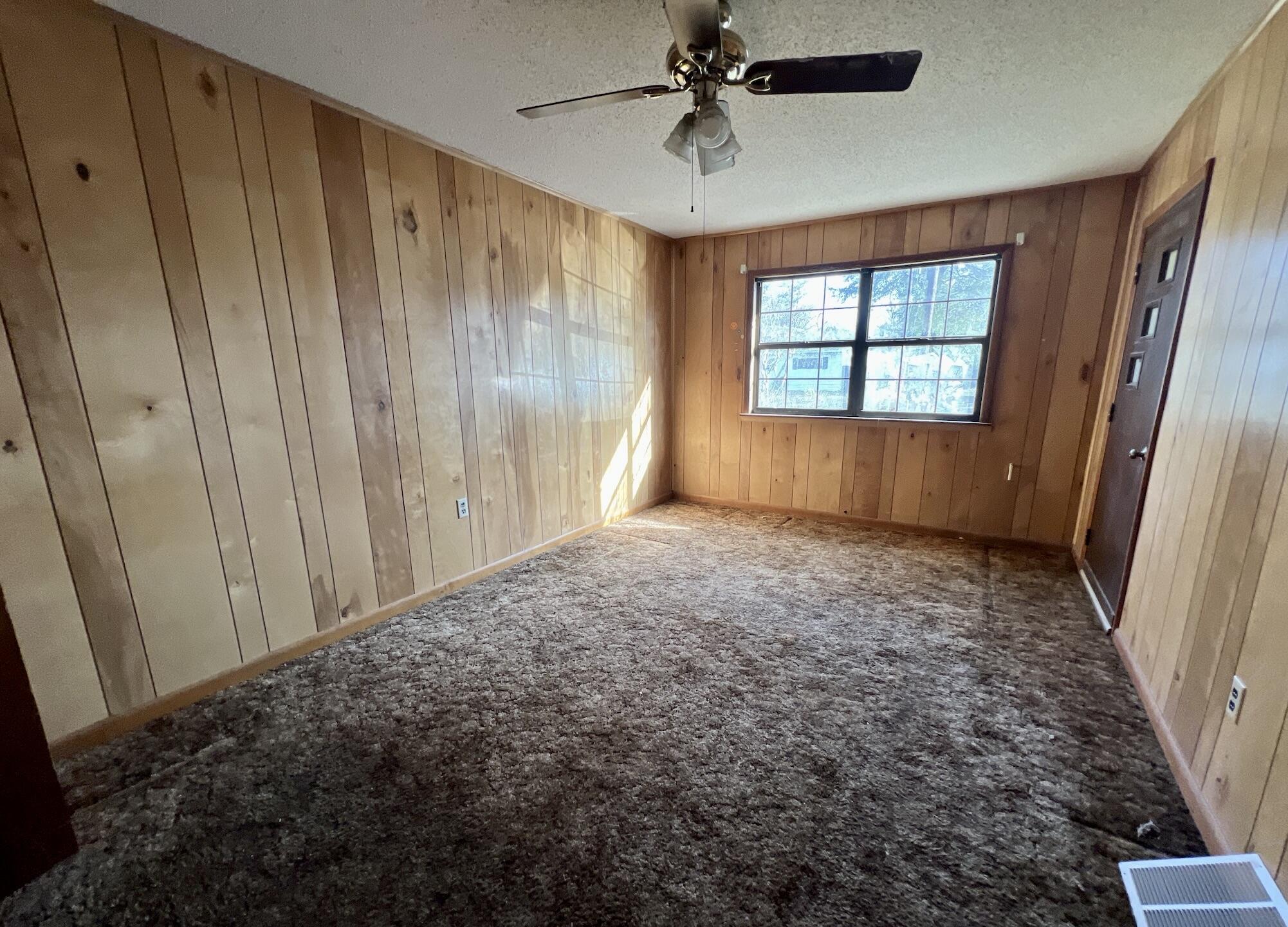 215 Seminole Trail Crestview, FL 32536 - Photo 5 of 20 a view of room with window and a ceiling fan