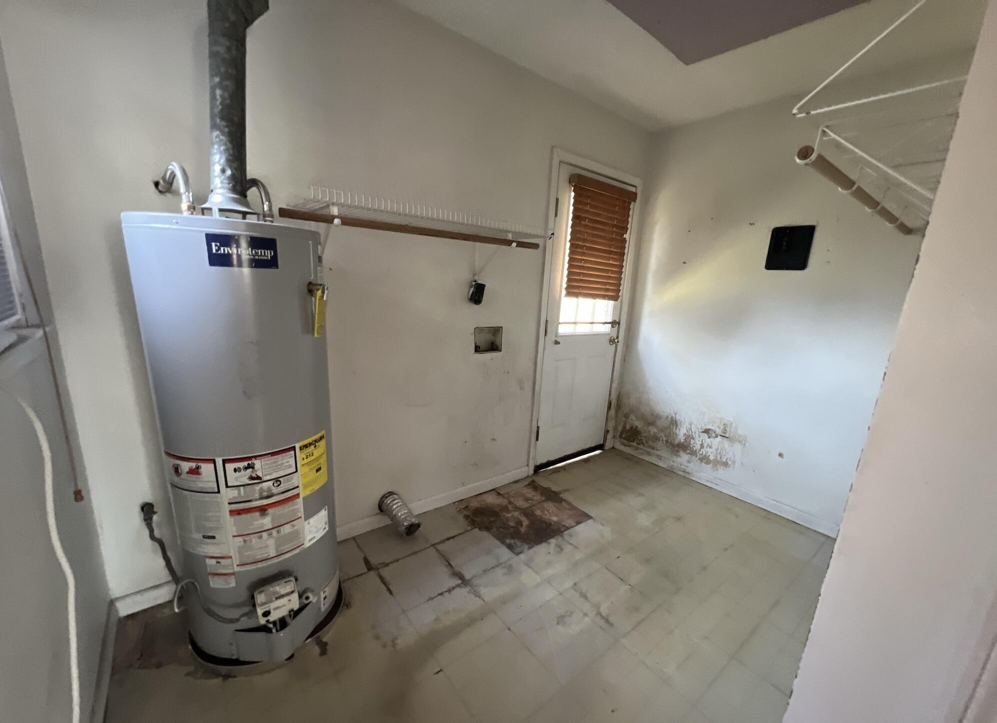 215 Seminole Trail Crestview, FL 32536 - Photo 7 of 20 a view of a storage & utility room with a sink