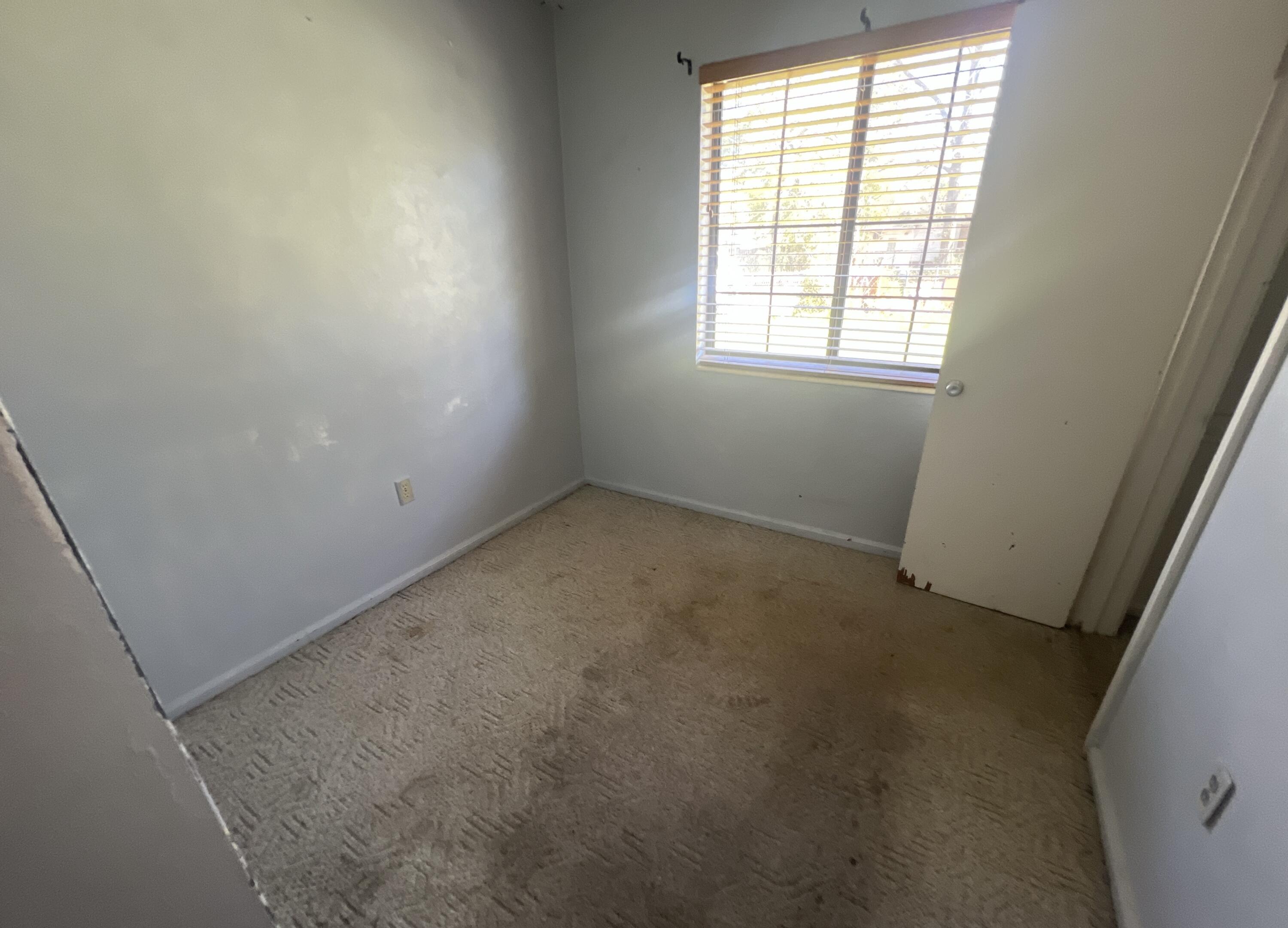 215 Seminole Trail Crestview, FL 32536 - Photo 8 of 20 an empty room with a window