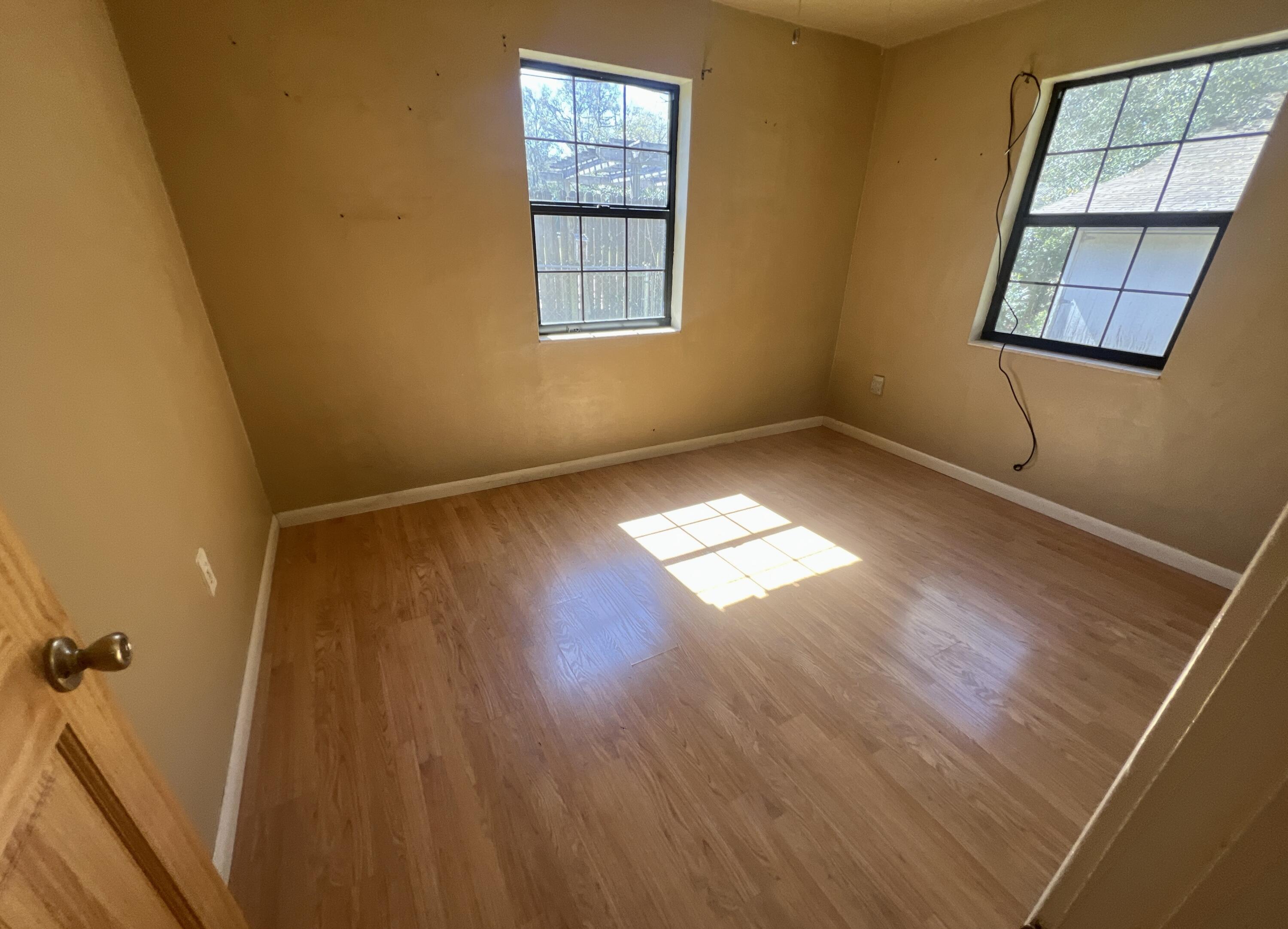 215 Seminole Trail Crestview, FL 32536 - Photo 10 of 20 a view of an empty room and window