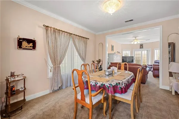 a kitchen with stainless steel appliances granite countertop a stove sink and cabinets