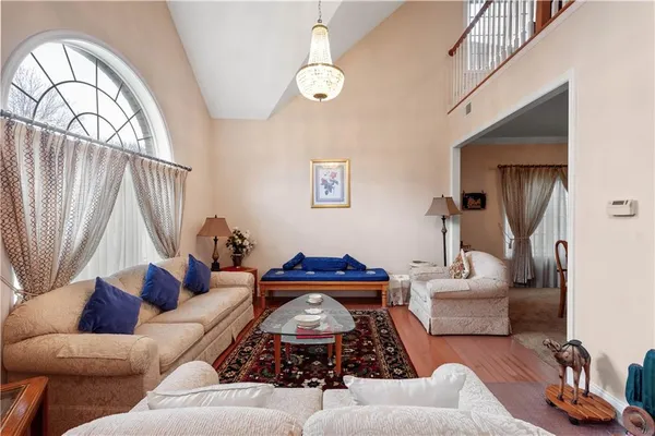 a living room with furniture and a table