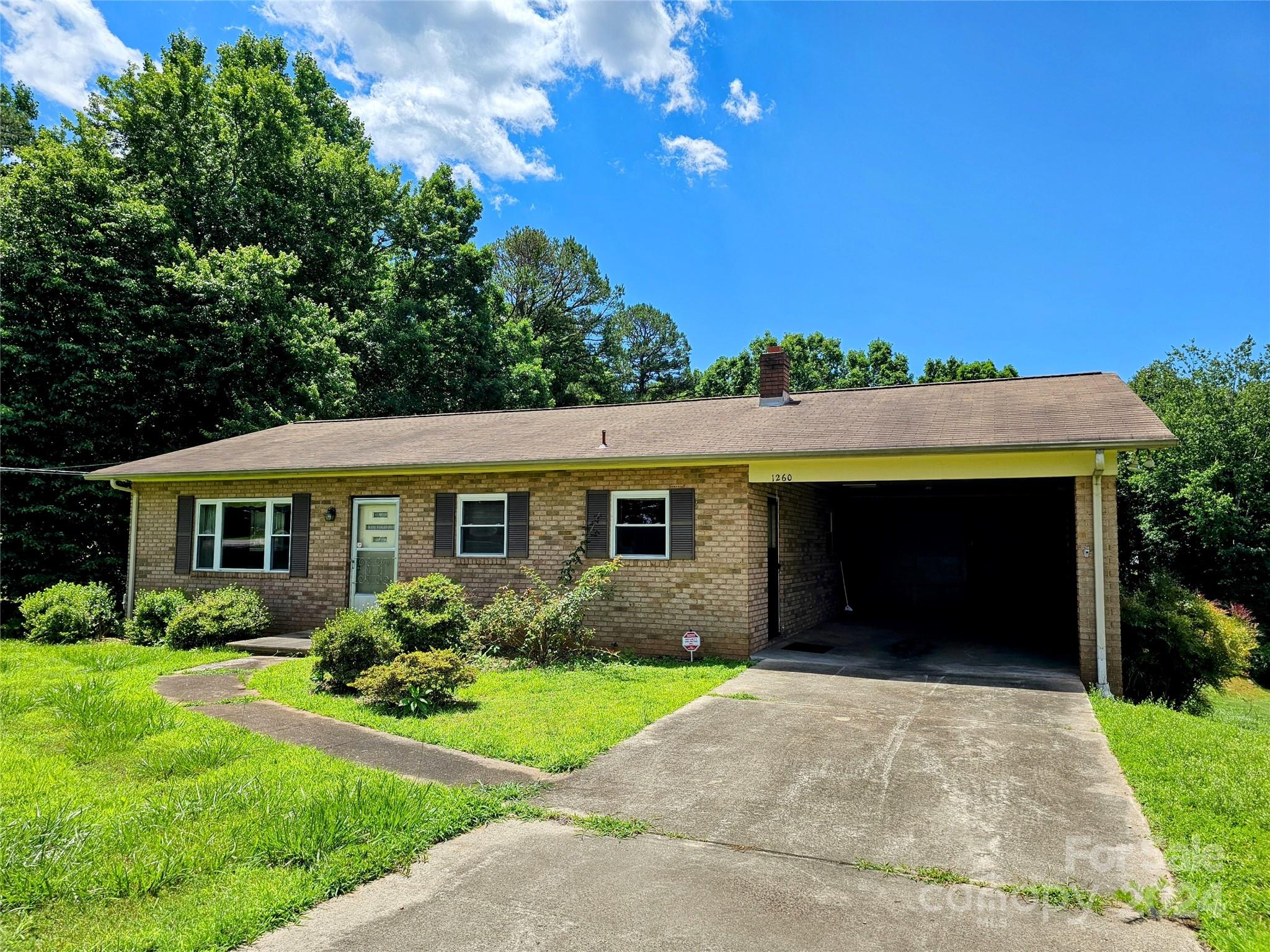 1260 Bethel Road Morganton, NC 28655 - Photo 1 of 13 a front view of house with yard and green space