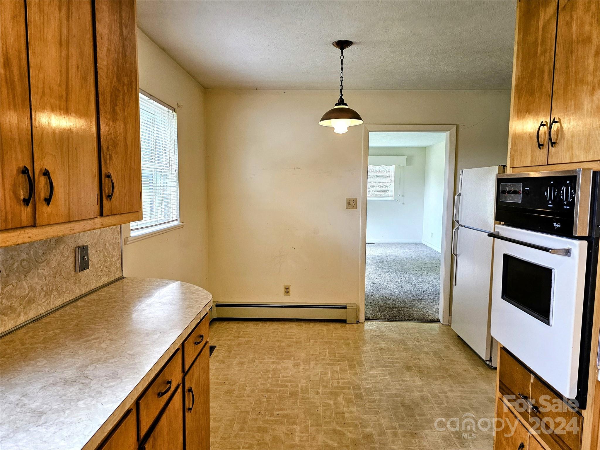 1260 Bethel Road Morganton, NC 28655 - Photo 5 of 13 a view of a kitchen with a sink and dishwasher kitchen view