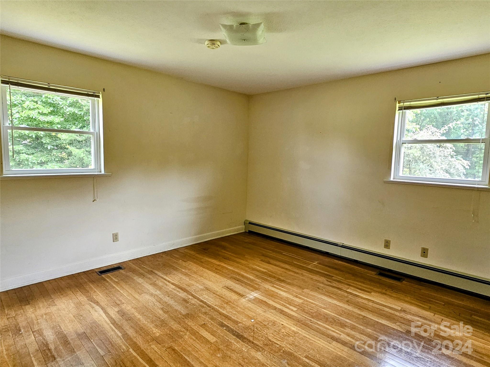 1260 Bethel Road Morganton, NC 28655 - Photo 7 of 13 an empty room with a window