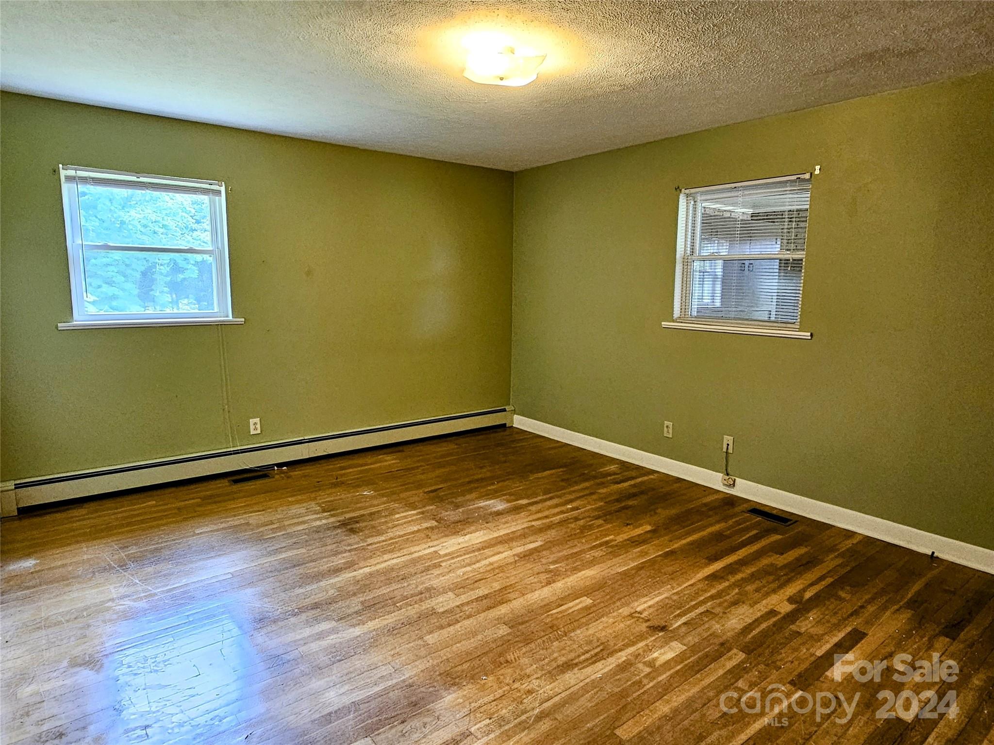 1260 Bethel Road Morganton, NC 28655 - Photo 9 of 13 a view of a room with wooden floor and a window
