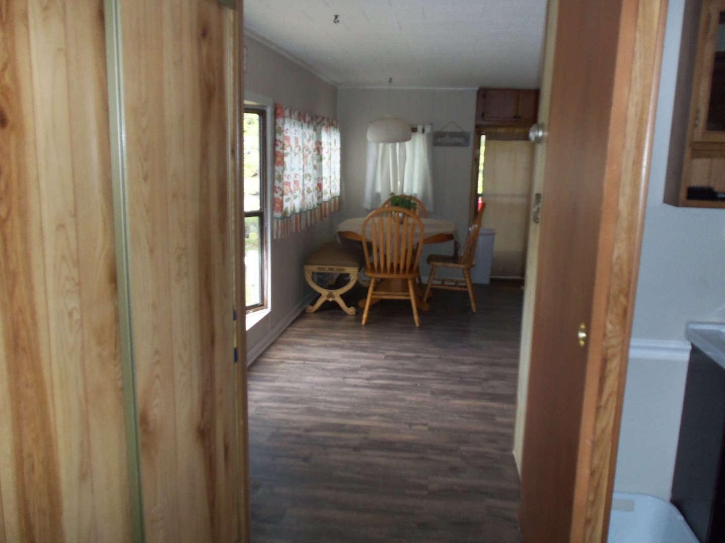 21-216 Woodhaven Sublette, IL 61367 - Photo 13 of 23 a view of a hallway with furniture and a window