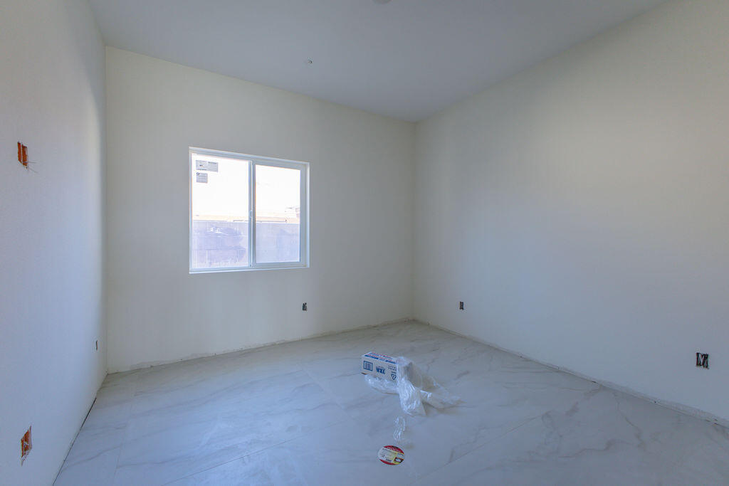 68855 Ortega Road Cathedral City, CA 92234 - Photo 6 of 19 an empty room with a window