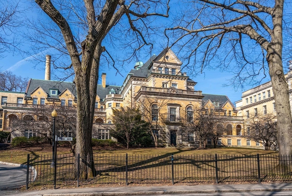 60 Glen Road, Unit 108 Brookline, MA 02445 - Photo 18 of 18 a view of a building with a street