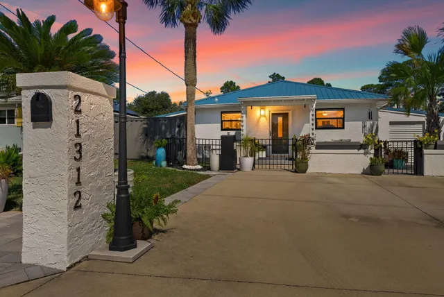 a view of a house with a street