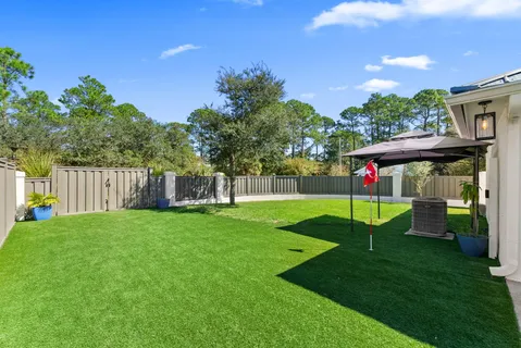 an aerial view of a house with swimming pool