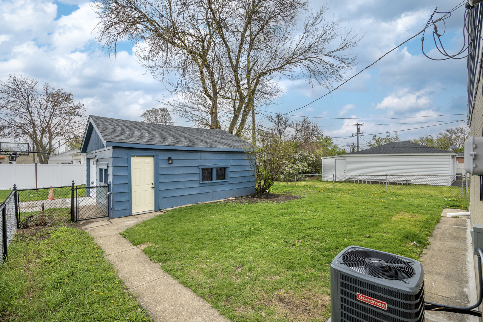 1415 North Taft Avenue Berkeley, IL 60163 - Photo 23 of 24 a view of a house with a yard