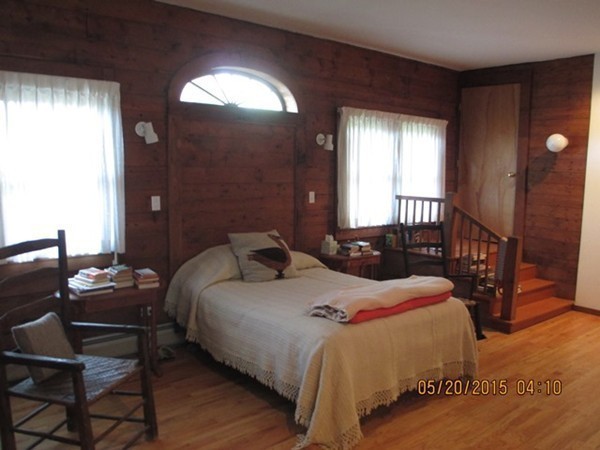 16 Ledge Road Heath, MA 01346 - Photo 23 of 28 a bedroom with a bed and wooden floor