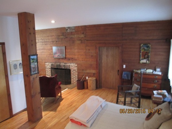 16 Ledge Road Heath, MA 01346 - Photo 25 of 28 a living room with furniture and a fireplace