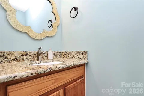 a view of kitchen island with wooden floor