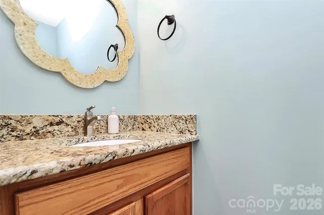 a view of kitchen island with wooden floor