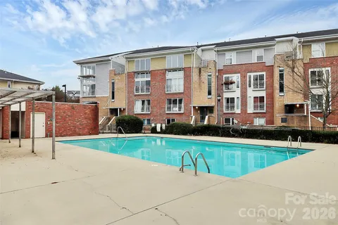a view of a house with a swimming pool