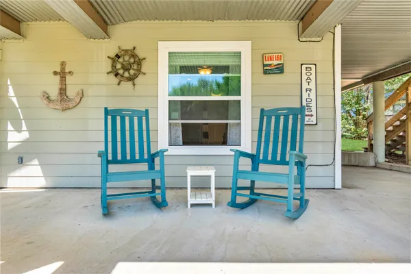 a view of front door with outdoor seating