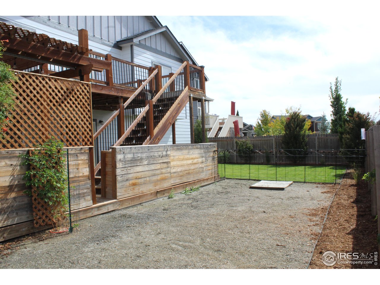 6743 Sequoia Street Frederick, CO 80530 - Photo 38 of 39 a view of outdoor space yard and deck