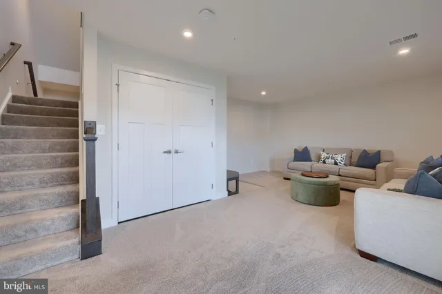 a view of livingroom with furniture and window