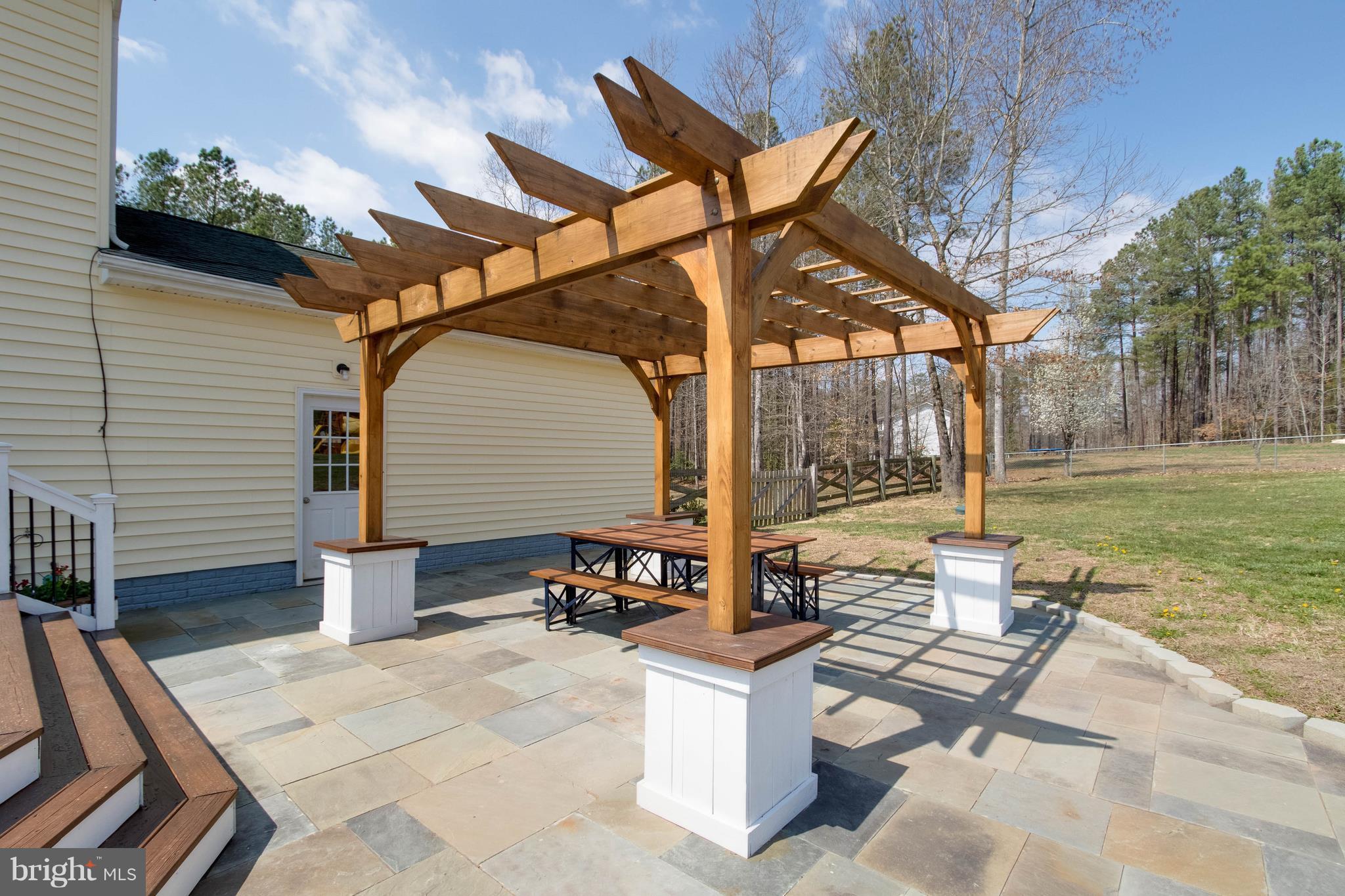 3299 Stingray Road Goldvein, VA 22720 - Photo 29 of 30 Enjoy Your Slate Patio with Pergola