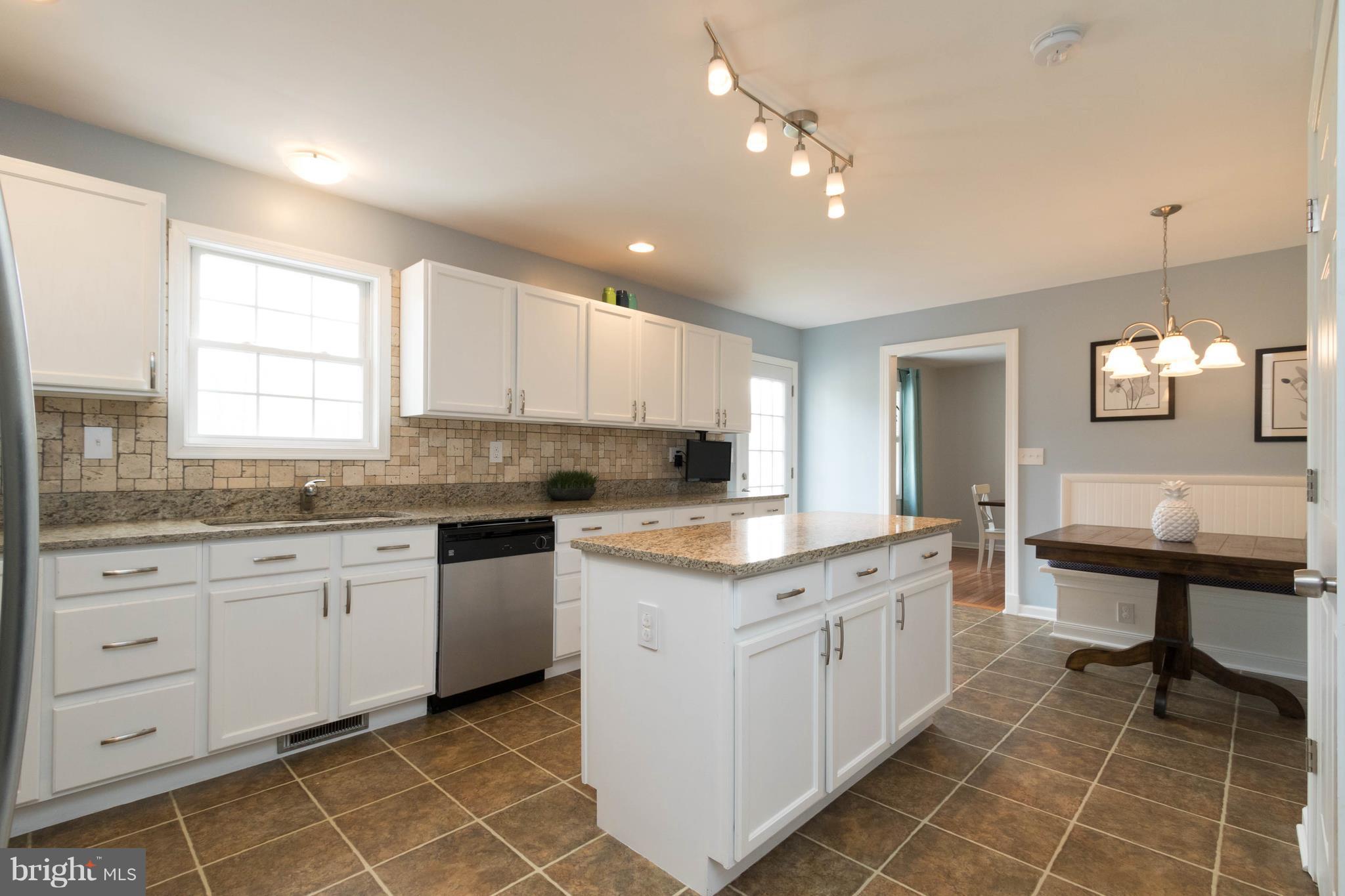 3299 Stingray Road Goldvein, VA 22720 - Photo 4 of 30 Kitchen with Granite Tops and Custom Tiled Backspl
