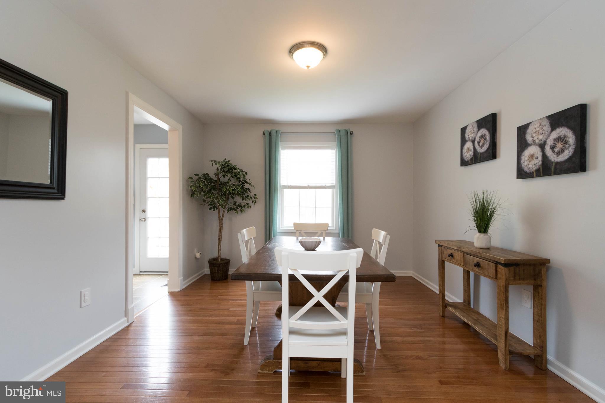 3299 Stingray Road Goldvein, VA 22720 - Photo 8 of 30 Dining Room with Gleaming Hardwood Flooring
