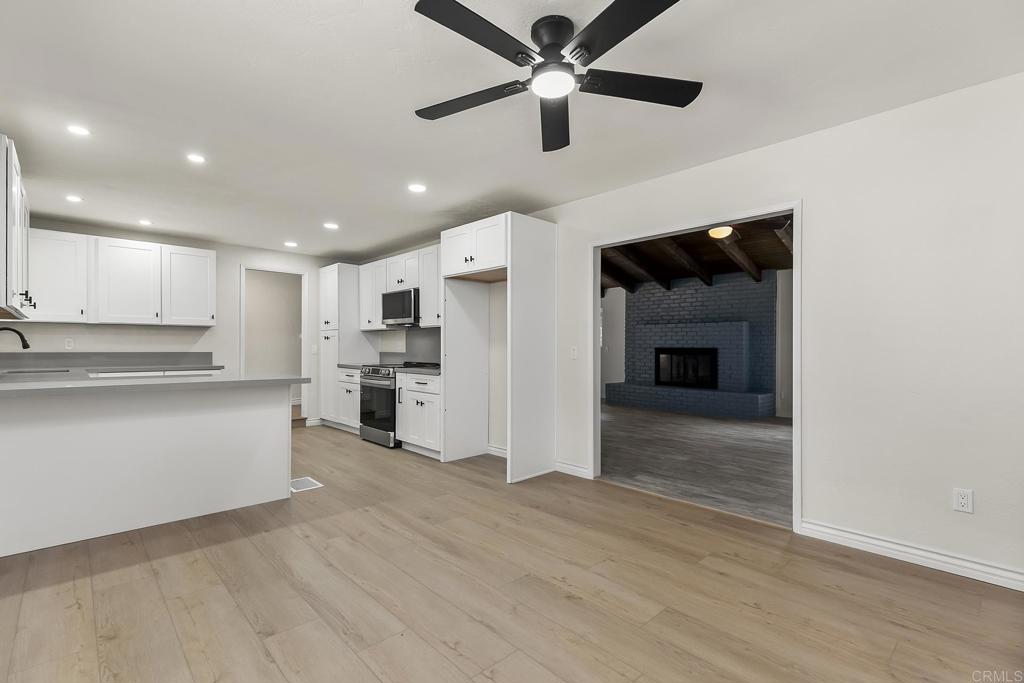 13500 Jamul Drive Jamul, CA 91935 - Photo 12 of 39 a view of a kitchen with a sink and a refrigerator