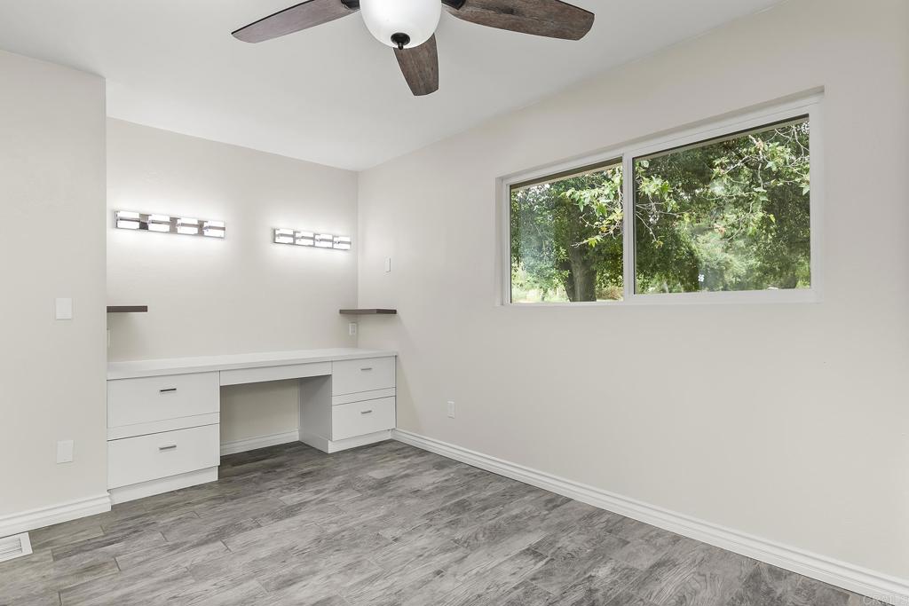 13500 Jamul Drive Jamul, CA 91935 - Photo 19 of 39 a view of a livingroom with an empty space and a window