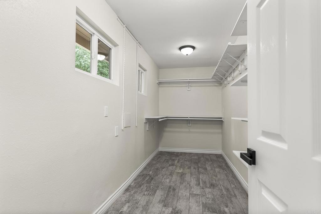 13500 Jamul Drive Jamul, CA 91935 - Photo 21 of 39 a view of walk in closet with empty racks