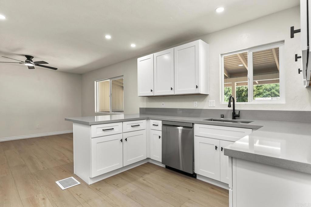 13500 Jamul Drive Jamul, CA 91935 - Photo 4 of 39 a kitchen with a sink cabinets and window