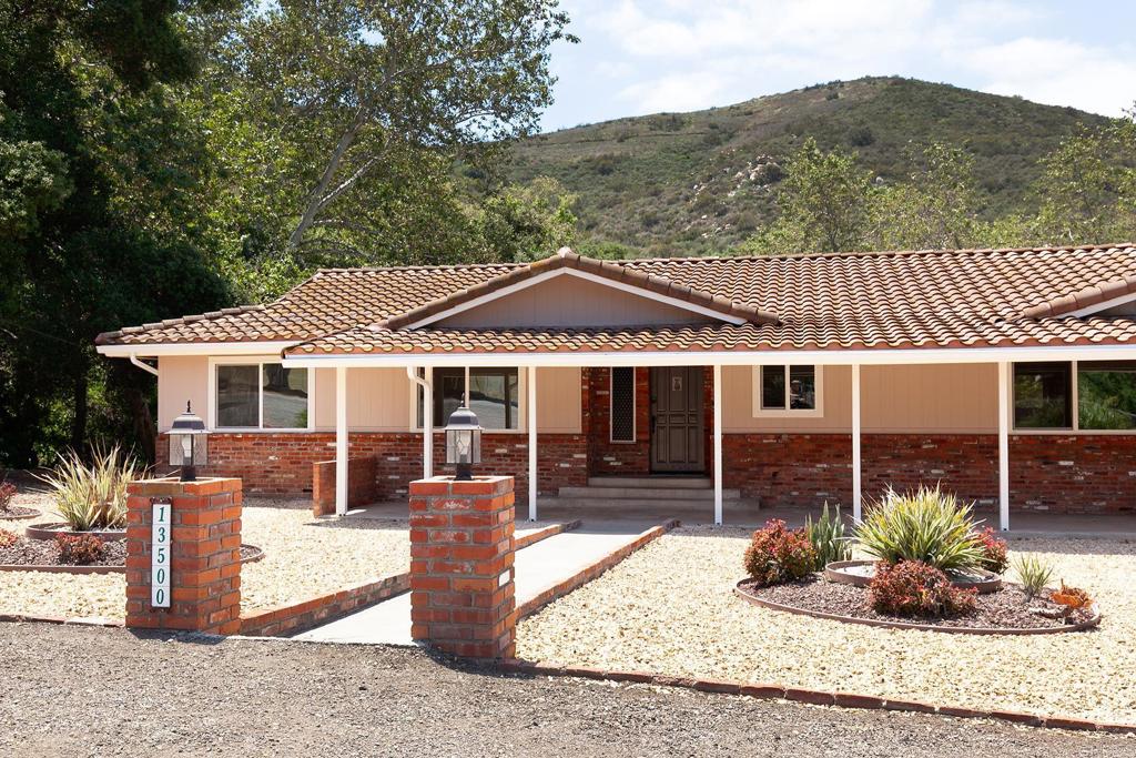 13500 Jamul Drive Jamul, CA 91935 - Photo 9 of 39 a front view of a house with garden