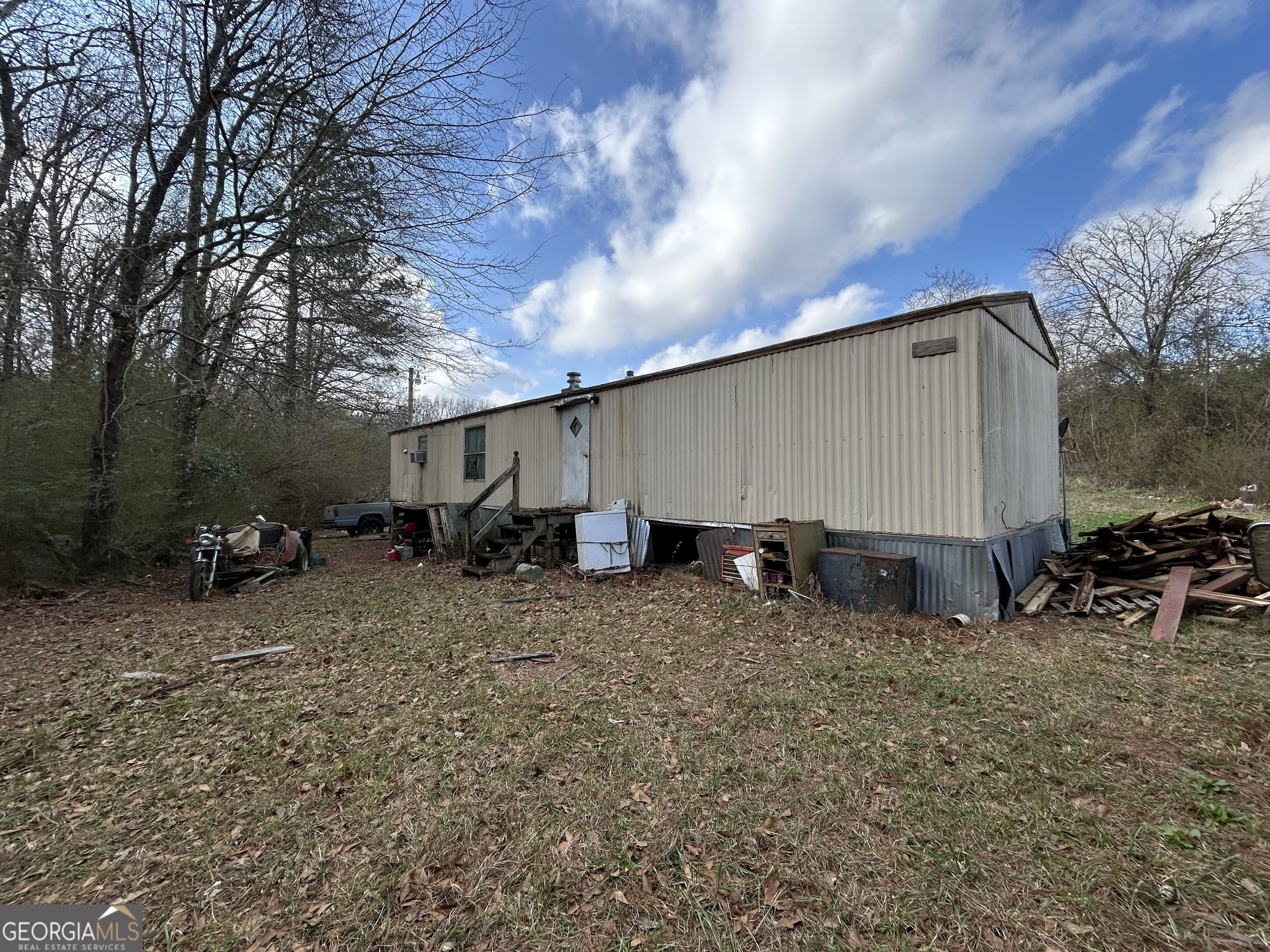 4334 Log Cabin Road Southwest White Plains, GA 30678 - Photo 11 of 20 a view of a house with backyard